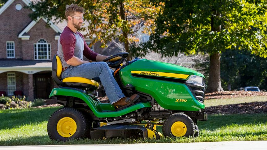 man riding x350 lawn tractor